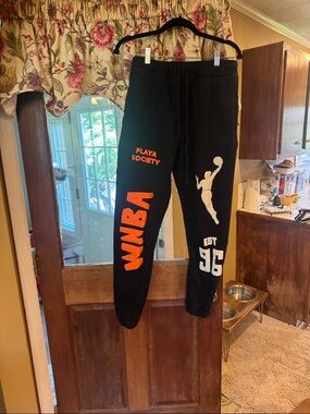 WNBA Black Sweatpants with Orange & White Graphics